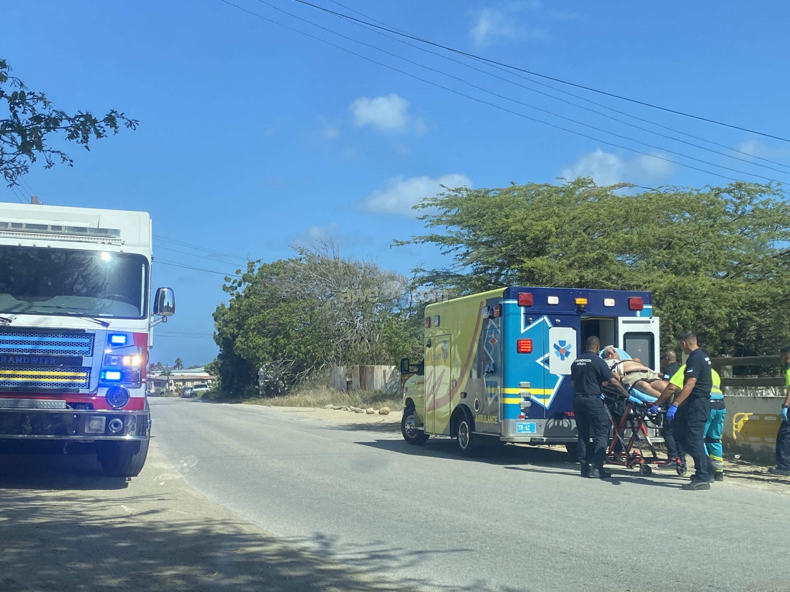 Firefighters assist ambulance in lowering patient from second floor in Tanki Leendert