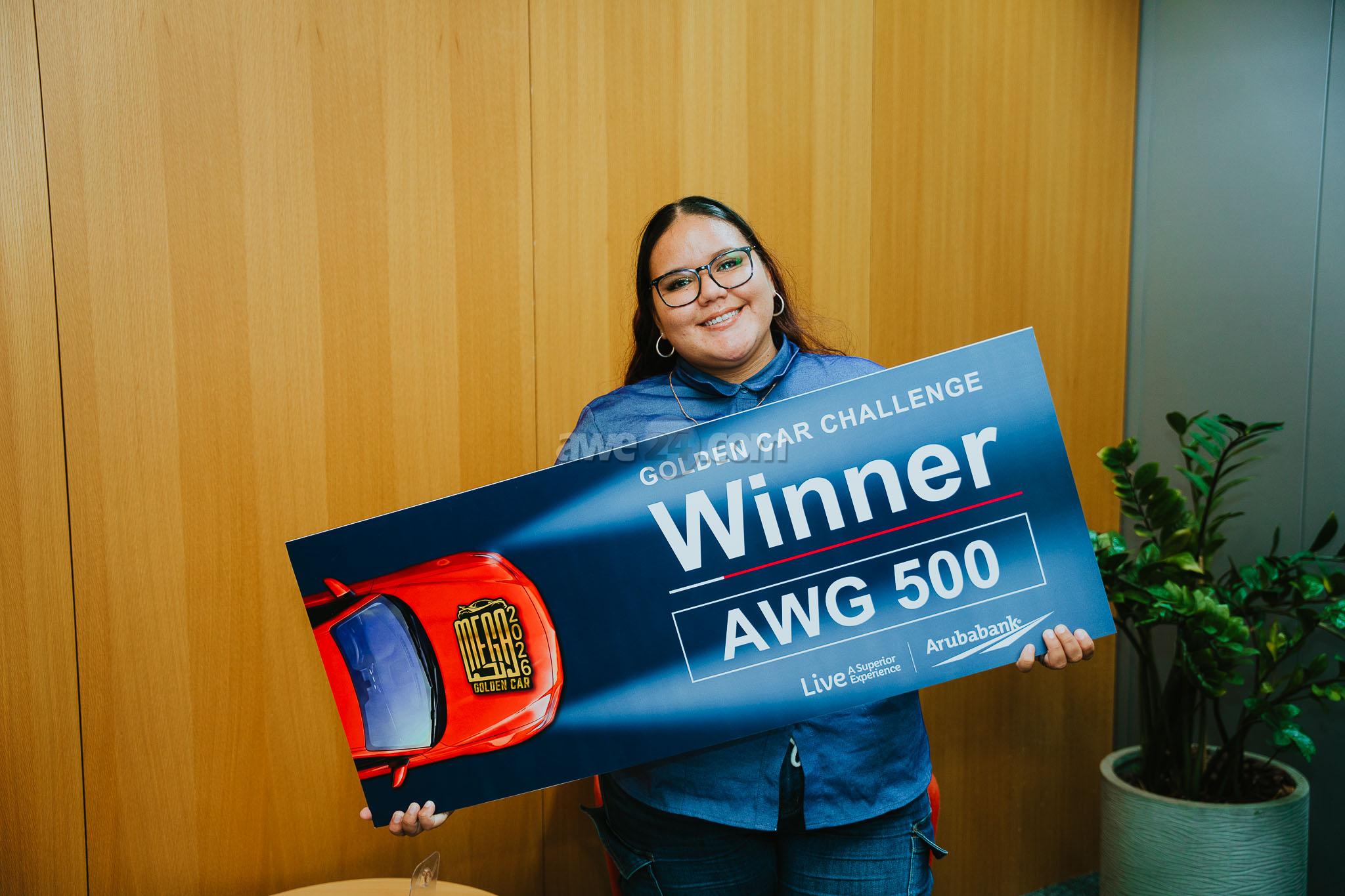 Tasha Rasmijn Wins AWG 500 in Aruba Bank's MEGA Golden Car Challenge